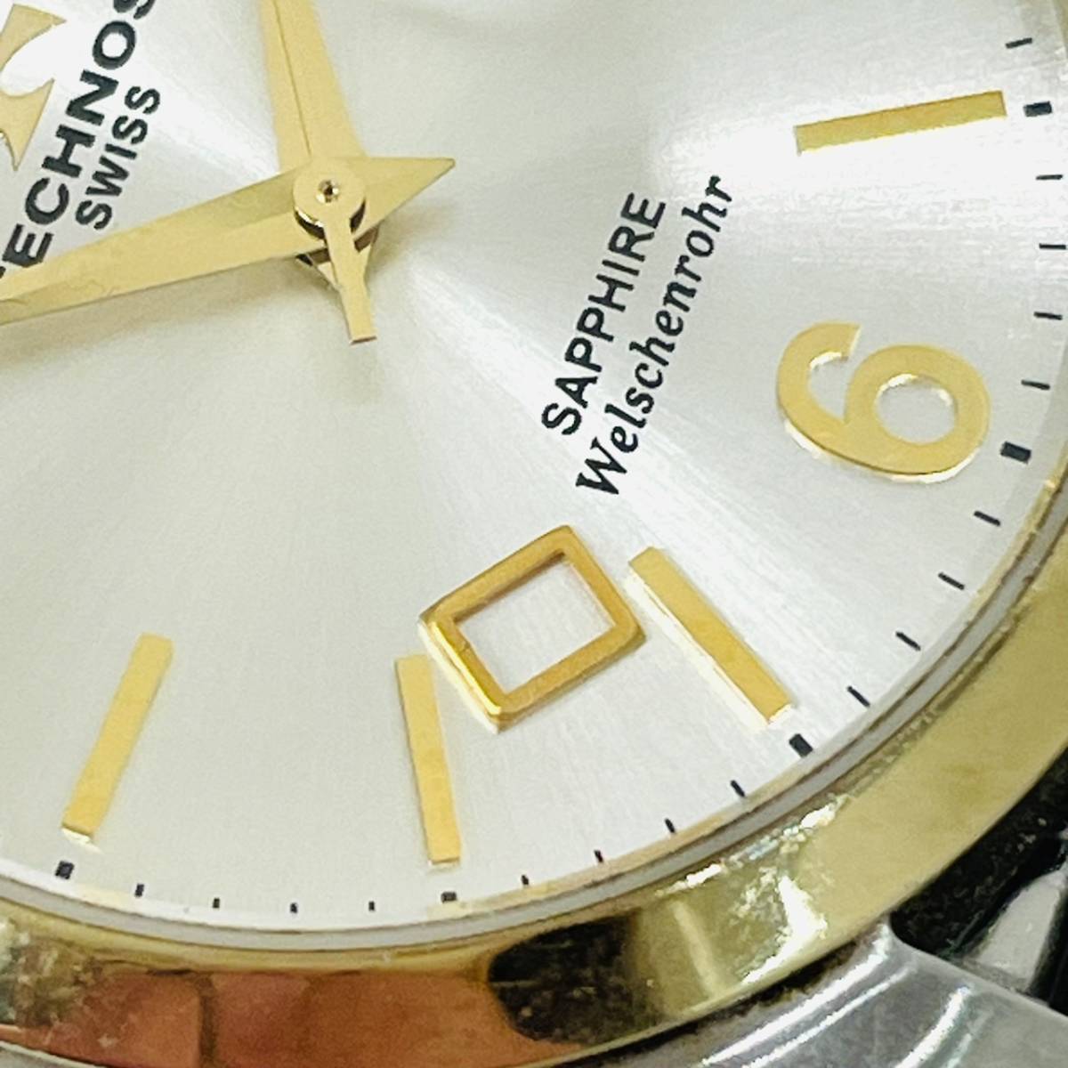 【B13136KM】現在稼働品 TECHNOS テクノス SAPPHIRE Welschenrohr TGM656 腕時計 メンズウォッチ クオーツ 白文字盤 シルバー色 ゴールド色_画像10