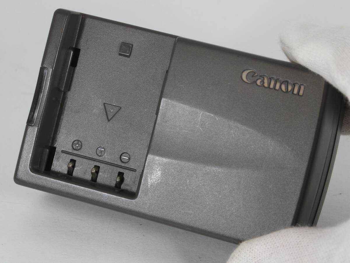 c)* Canon Canon original charger CB-2LT charge has confirmed 