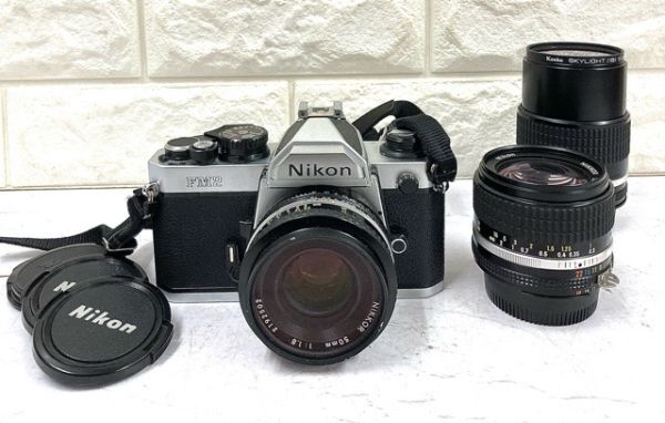 Nikon FM2 フィルムカメラ+NIKKOR 50mm 1:1.8+28mm 1:2.8+135mm 1:3.5 レンズ3本付 動作未確認 fah 2A753_画像1