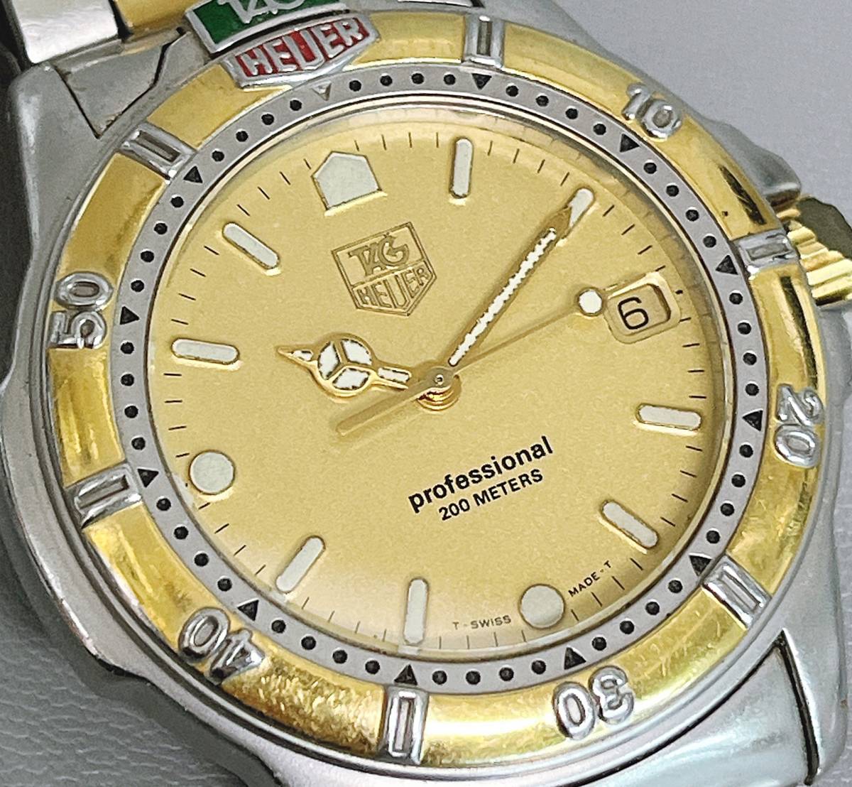 タグホイヤー プロフェッショナル200m クォーツ デイト ゴールド文字盤 995.406K 腕時計_画像2
