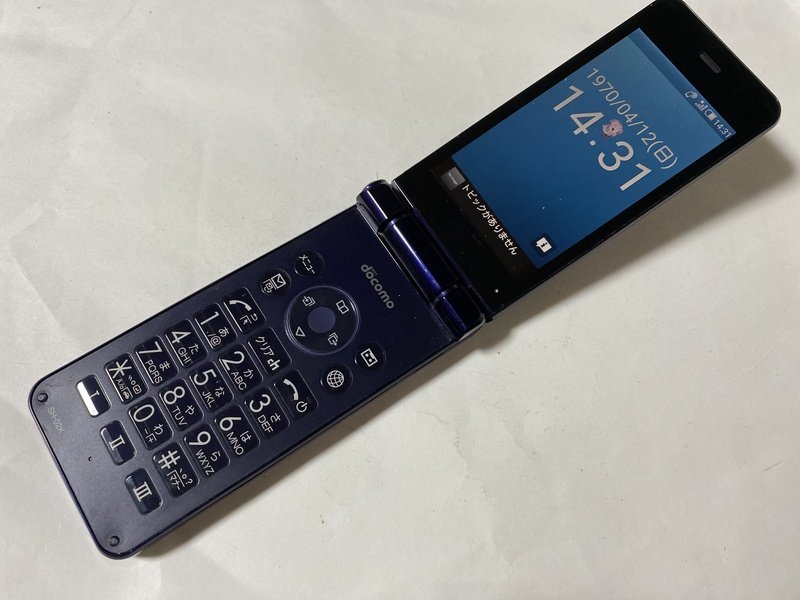 IE980 docomo SH-02K 8GB ブルーブラック ジャンク_画像1