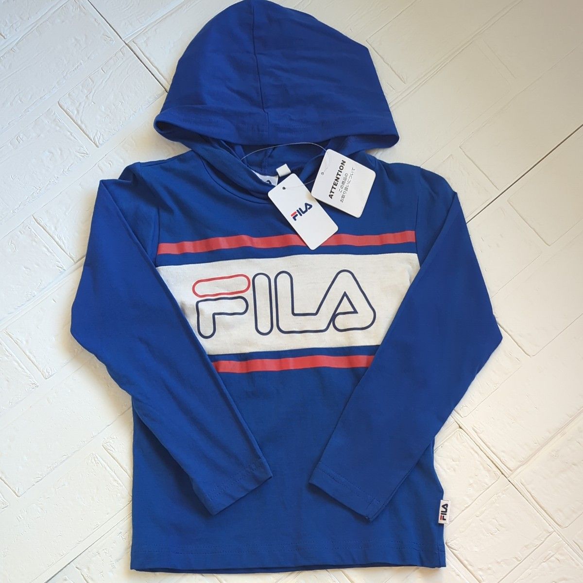 【新品】タグつき　FILA　フィラ　 パーカー 長袖Tシャツ　ロンT　サイズ120　ブルー　青　フード　ロゴつき　ボーイズ