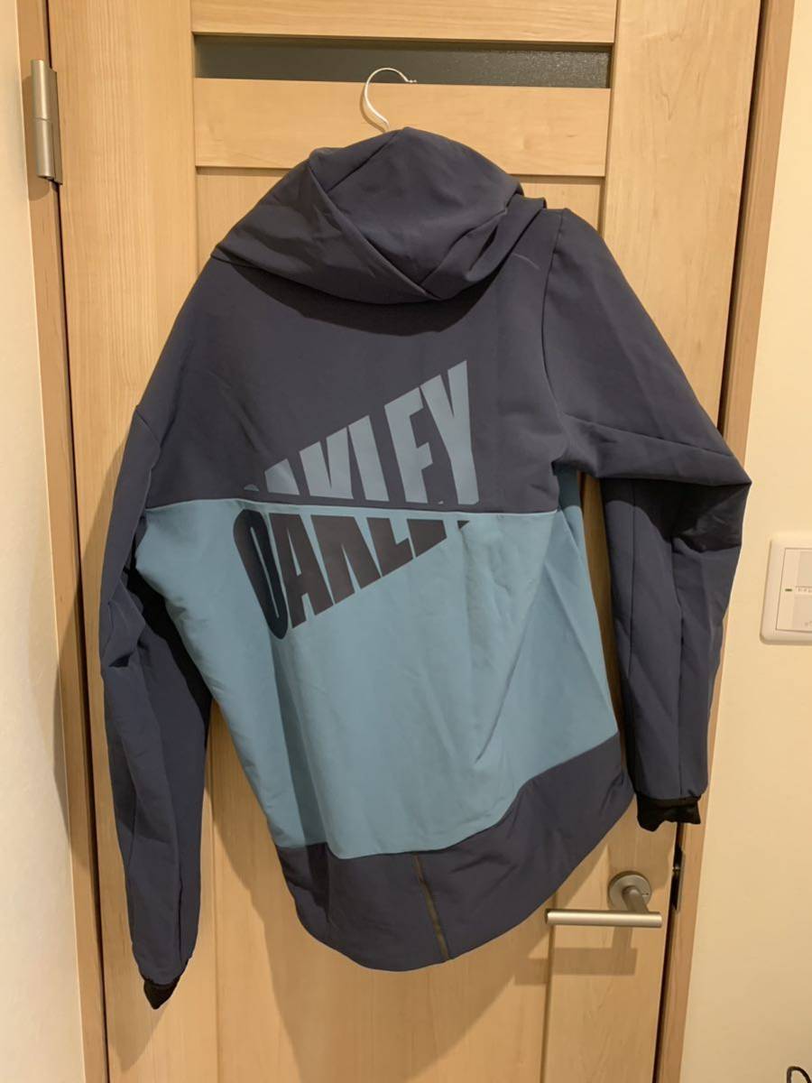  Oacley outer ENHANCE SOFTSHELL JACKET men's 616 BLUE/LIGHT BLUE US M ( size L corresponding ) 412854JP jacket training wear 