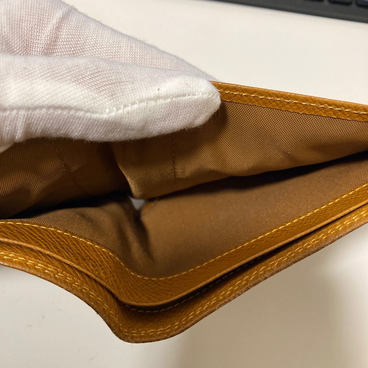 *12084 FILA folding twice purse Brown leather 