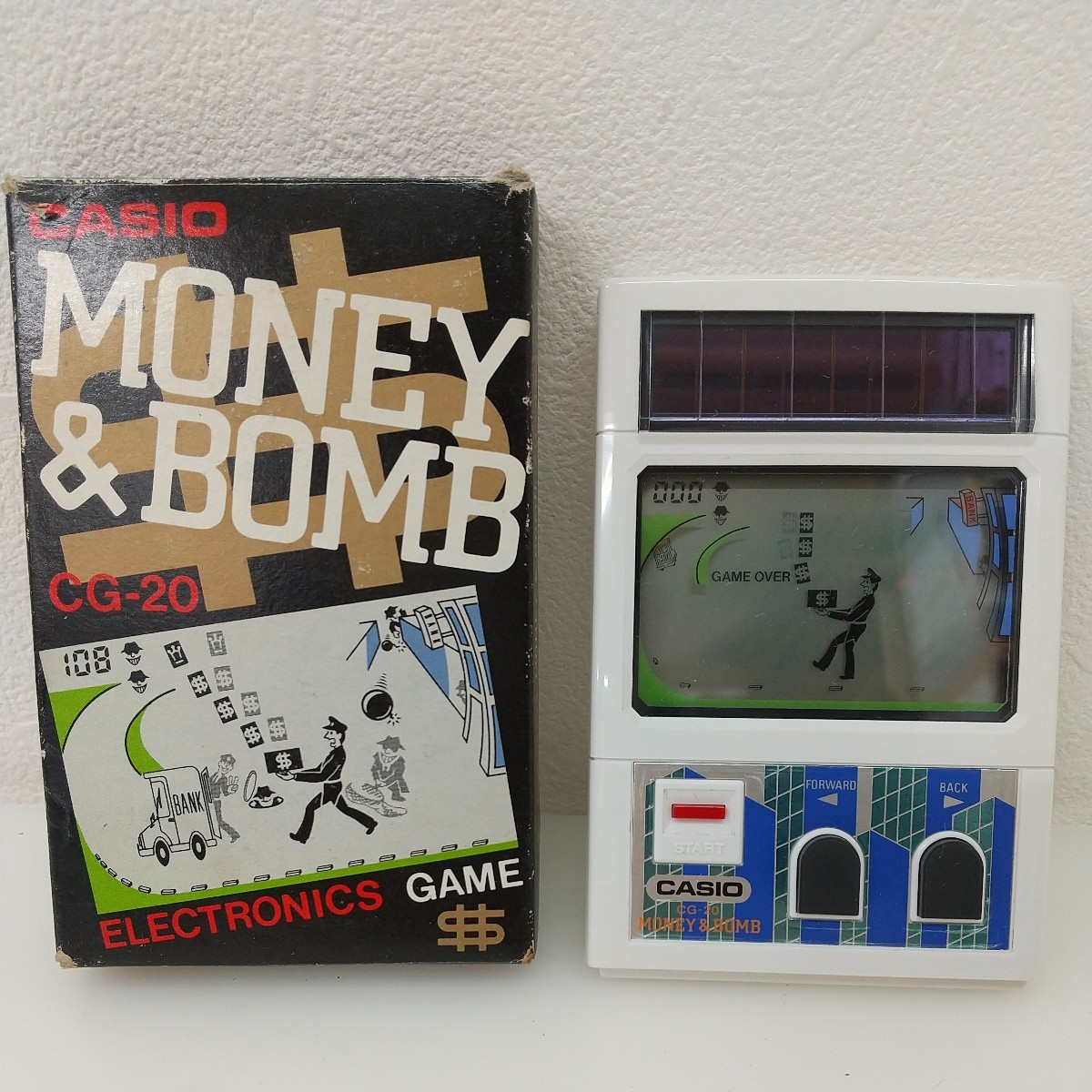 126　中古　CASIO　カシオ　携帯ゲーム機　MONEY＆BOMB(マネー＆ボン)　CG-20　懐かし電子ゲーム機　ソーラー駆動　デッドストック_画像1