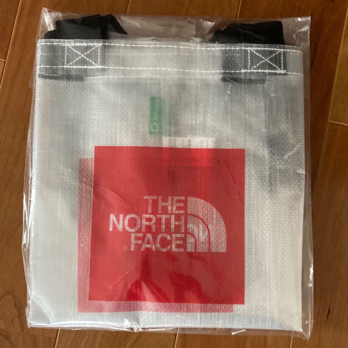 【新品・未使用】ノースフェイス クリアトートバッグ エコバッグ 透明 赤ロゴ