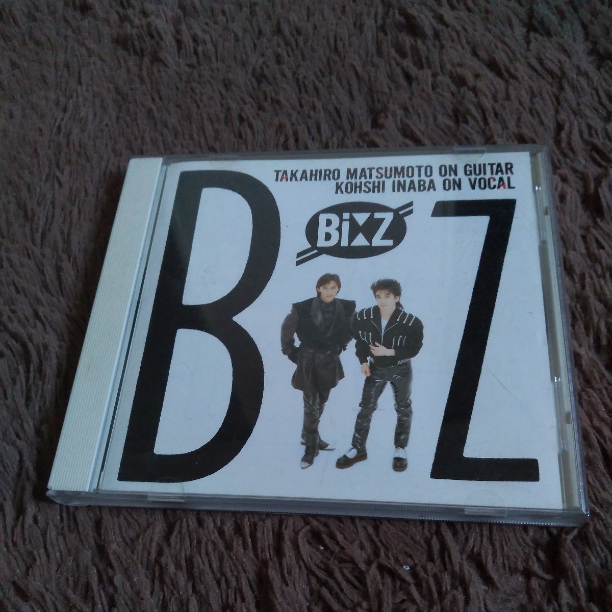 1st B’z （ビーズ）/ B’z ■88年盤10曲収録 CD アルバム ♪だからその手を離して,君を今抱きたい,Fake Lips,他 R32A-1041 美品_画像1