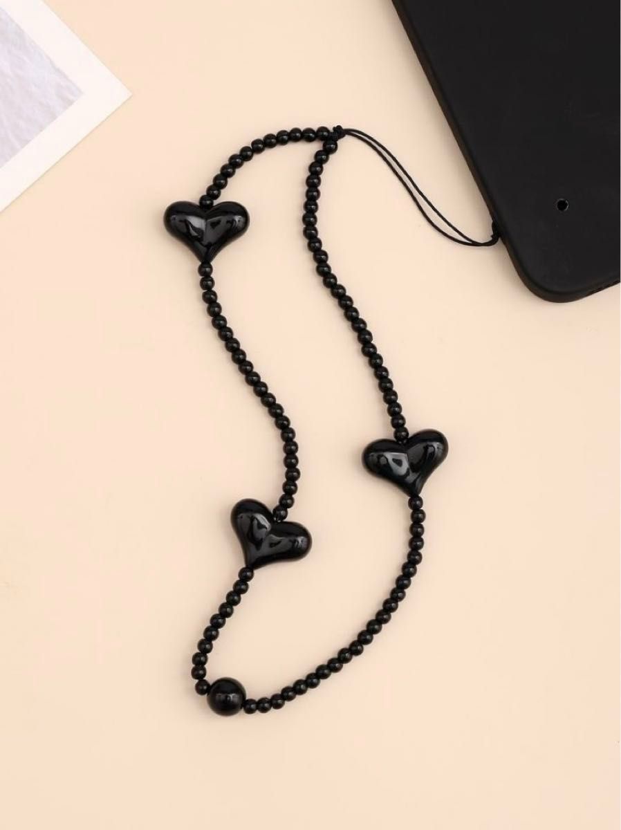 セレブ愛用《String Ting》ハート スマホストラップ ブラック セレブ愛用《String Ting》ハート スマホストラップ ブラック