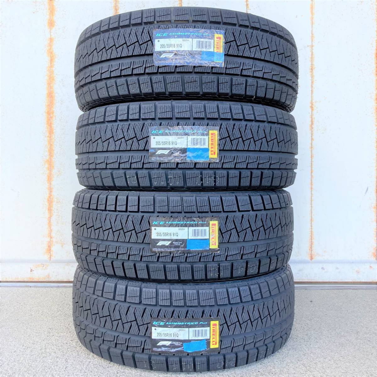 収納袋付 送料無料 4本セット (LM0002.8) 205/55R16 91Q PIRELLI ICE ASIMMETRICO Plus 2021年製造 屋内保管 スタッドレスタイヤ 205/55/16_画像1