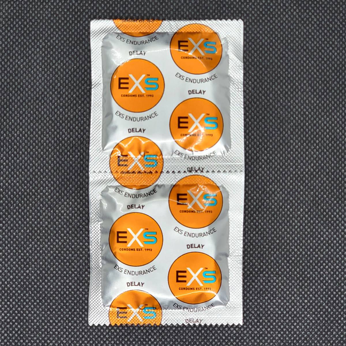 【匿名配送】【送料無料】 早漏防止コンドーム EXS 12個　スキン 避妊具