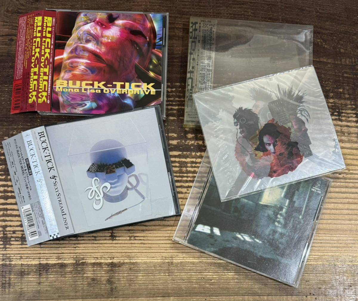 帯付 初回盤 CD3枚セット】BUCK-TICK バクチク■狂った太陽 クリアシート付■SEXY STREAM LINER■Mona Lisa OVERDRIVE■櫻井敦司 今井寿_画像1