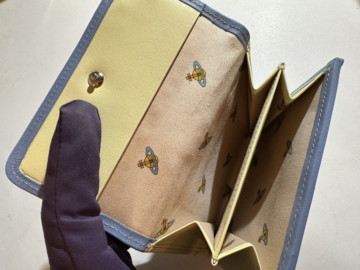 新品ヴィヴィアンウエストウッド二つ折りチェック財布イエロー黄色