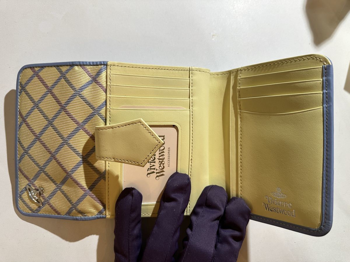 新品ヴィヴィアンウエストウッド二つ折りチェック財布イエロー黄色