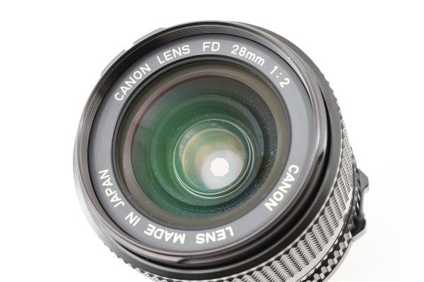* rare * Canon Canon NFD NEW FD 28mm F2 FD mount single burnt point lens #3875