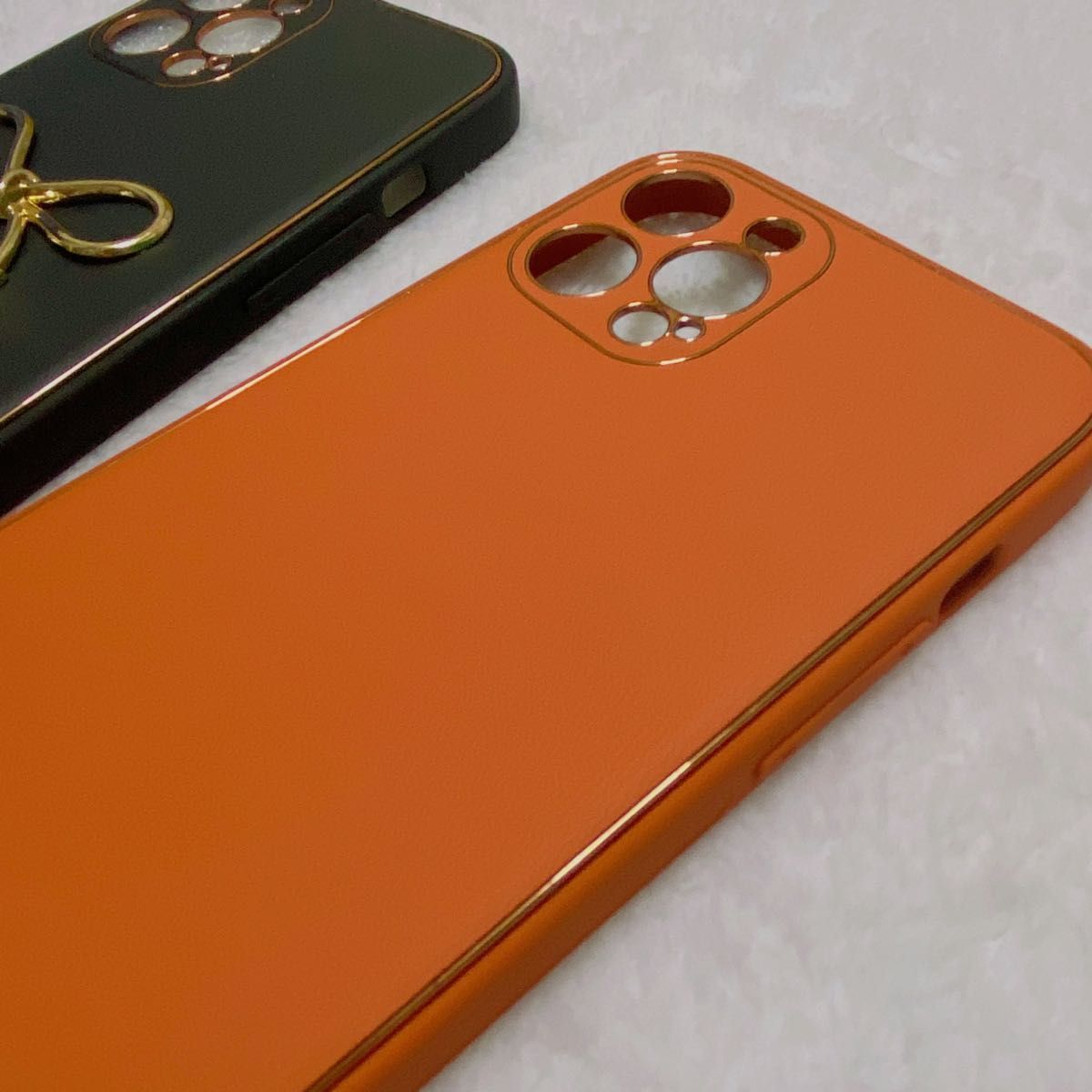 Phone12promax レザーケース　リボン　ブラック＆オレンジ　2点 上品な　高級感