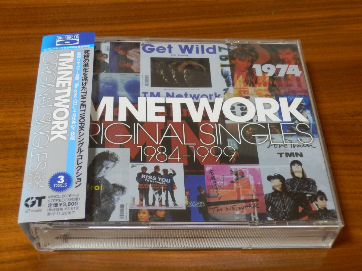 TM NETWORK CD3枚組ベストアルバム「ORIGINAL SINGLES 1984-1999」Blu-spec CD BEST TMN 小室哲哉 宇都宮隆 木根尚登 レンタル落ち 帯あり_画像1