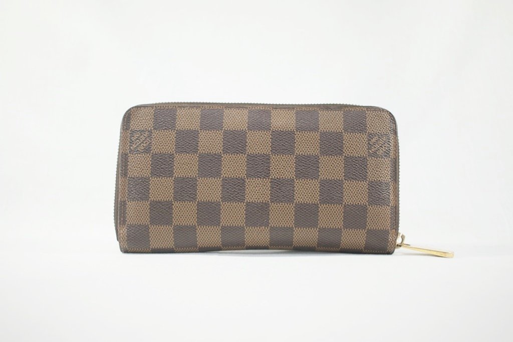 ◎ 中古品 LOUIS VUITTON N41661 ジッピー・ウォレット・ダミエ・エベヌ 長財布 旧モデル レザー 革 茶 ブラウン 財布 レディース メンズ_画像1