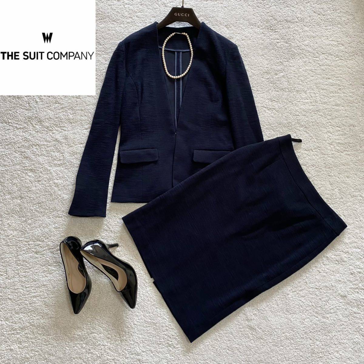 【美品】THE SUIT COMPANY she スーツ セットアップ ノーカラー カラーレス スカート 38 Mサイズ ネイビー スーツ カンパニー ママスーツ