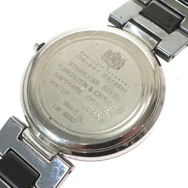 1円スタート 稼働品 ORIENT EXPRESS オリエント エクスプレス メンズ腕時計 OE 8032 クォーツ デイト セラミック ゴールド文字盤 ラウンド_画像4