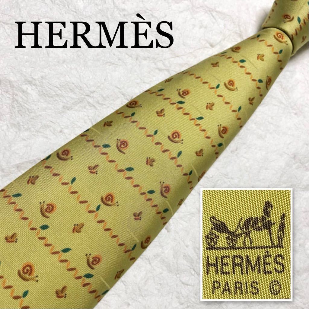 ■美品■HERMES エルメス　ネクタイ　カタツムリとチョウと葉っぱ　蝸牛　蝶　総柄　シルク100% フランス製　イエロー系_画像1