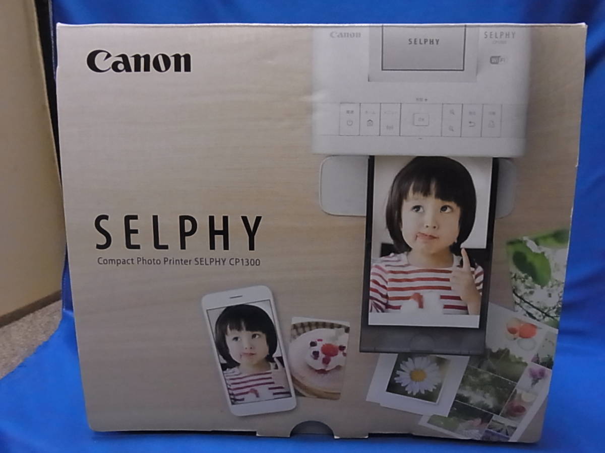 Canon コンパクトフォトプリンター SELPHY CP1300(WH)＋バッテリーNB-CP2L_画像1