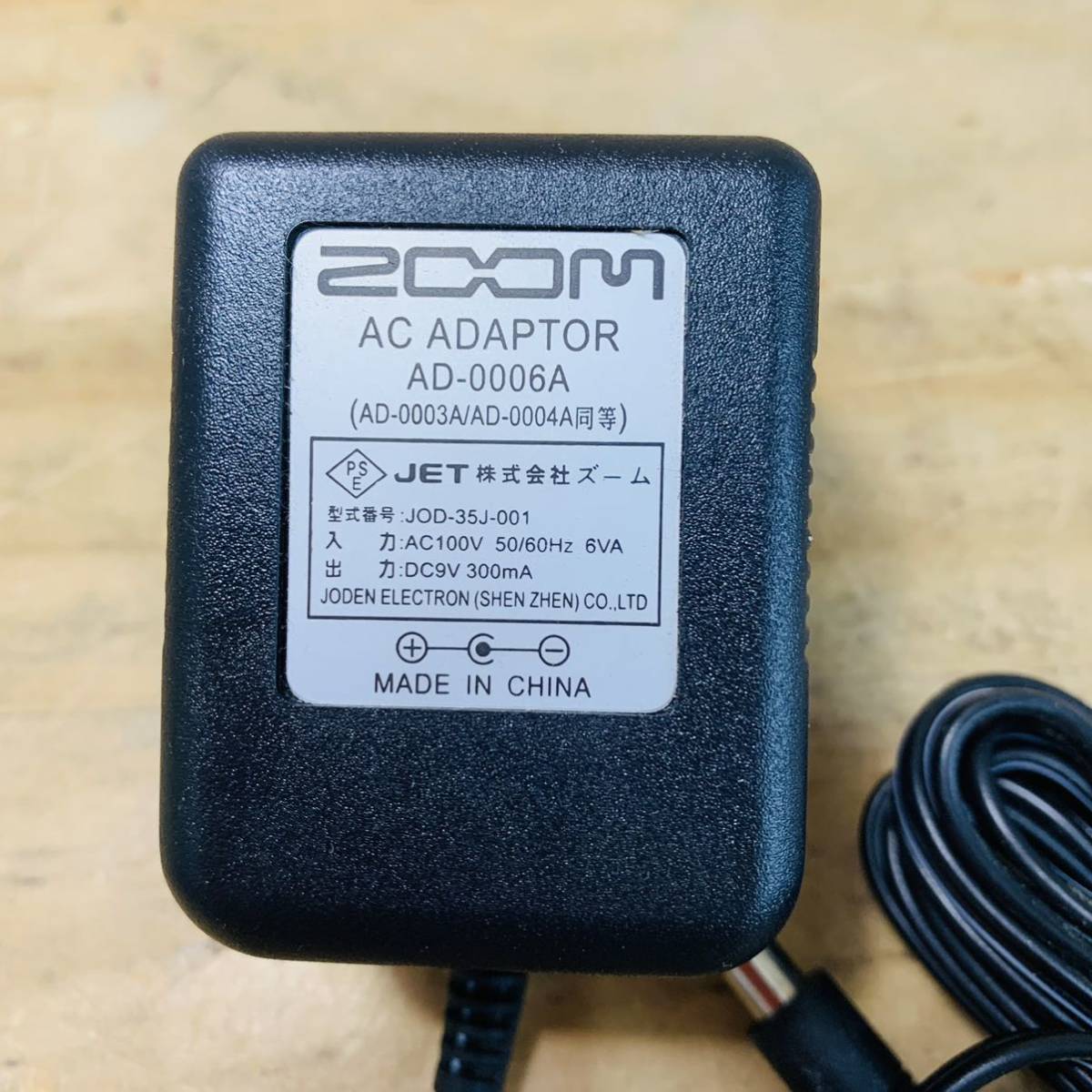 2F36197-5 Zoom AD-0006A AC adaptor zoom center minus 9V 300mA