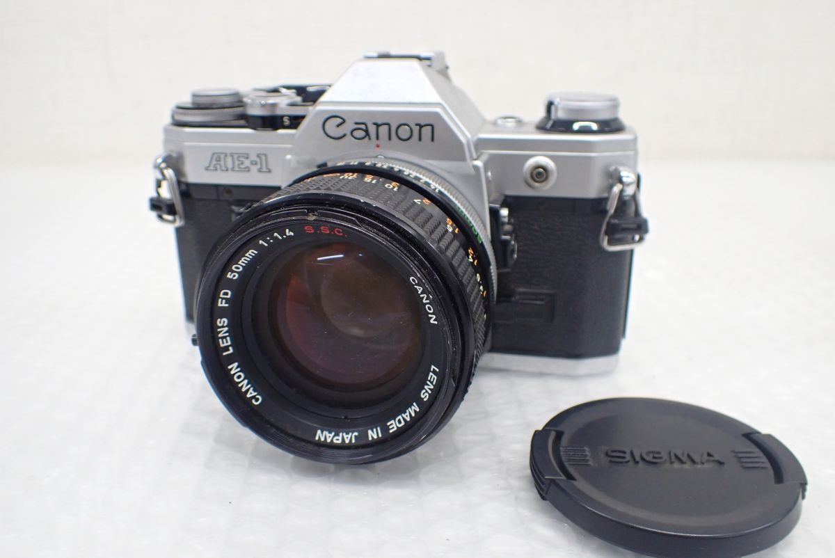 YS279-60　Canon キャノン AE-1 フィルムカメラ 一眼レフカメラ FD SSC 50mm f1.4 レンズ　中古現状品_画像1