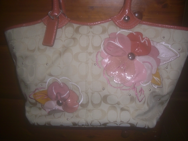 * Coach . flower motif. me tea me tea pretty BAG!