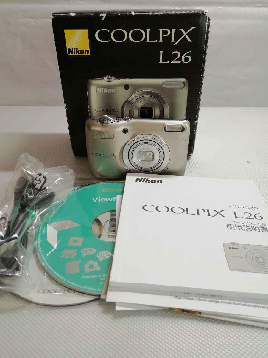 [ジャンク品] Nikon /ニコン COOLPIX L26 コンパクトデジタルカメラ シルバー 取説付き 欠品あり 傷あり_画像1