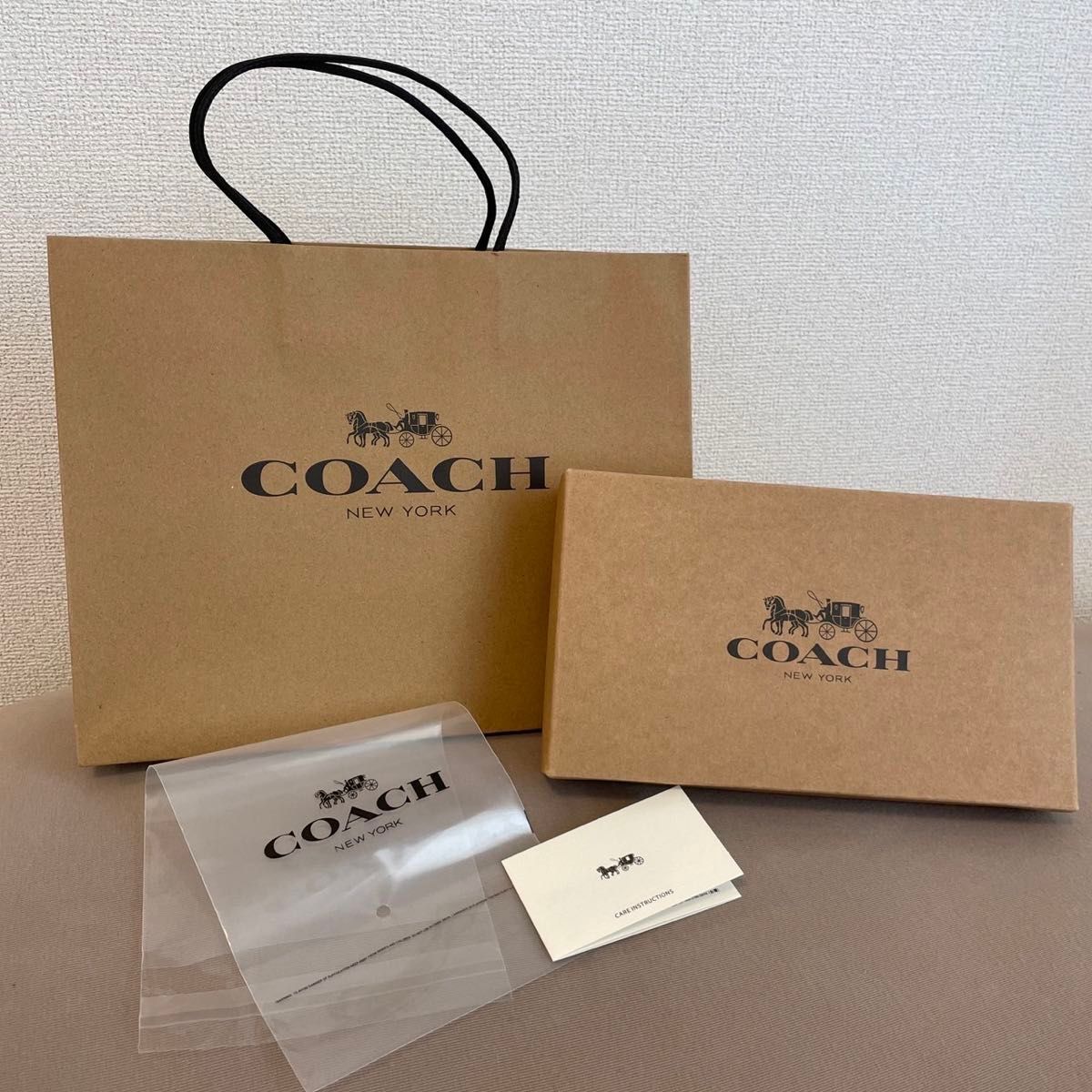 新品 COACH長財布 コーチ レディース メンズ シグネチャー ダークブラウン