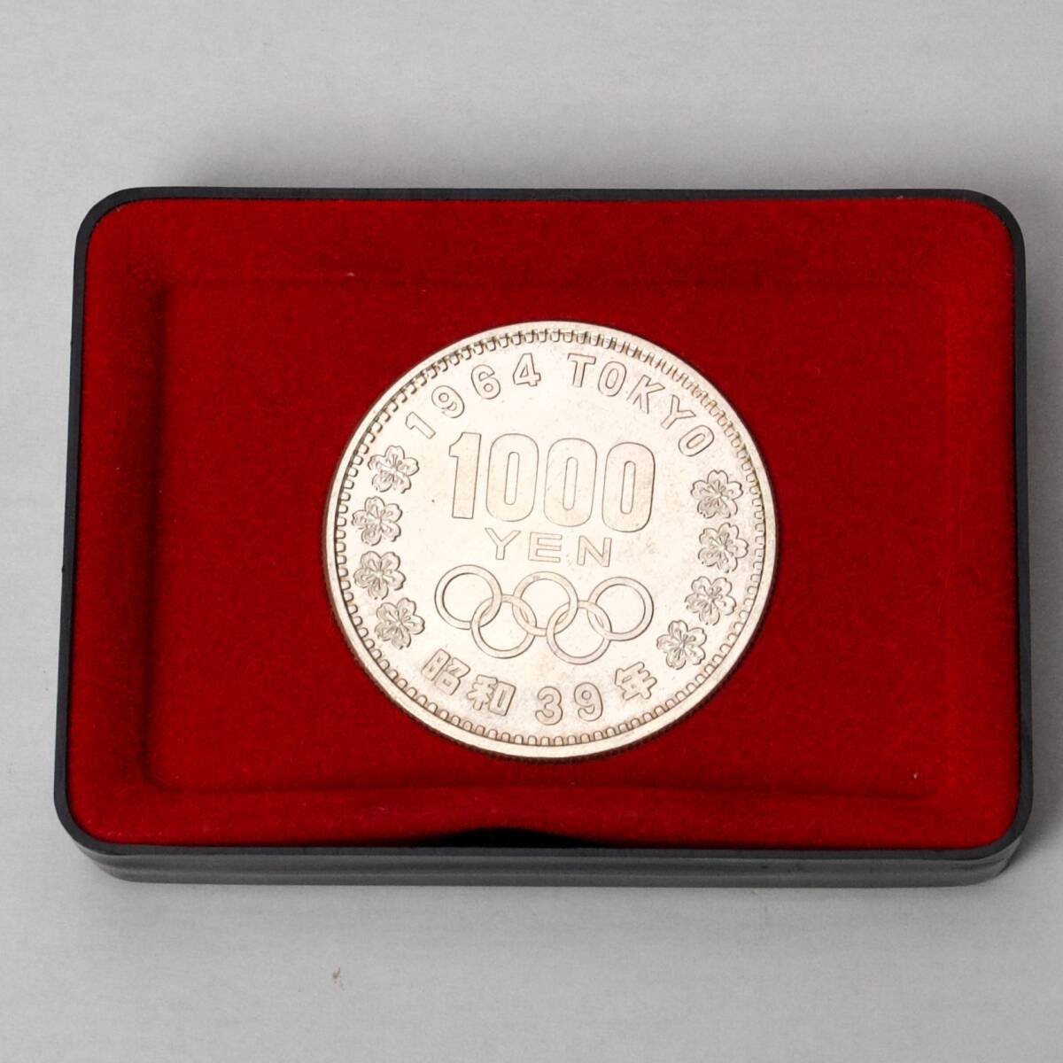送料込み・1964年・東京オリンピック記念・貨幣ケース入・1000円銀貨の画像1