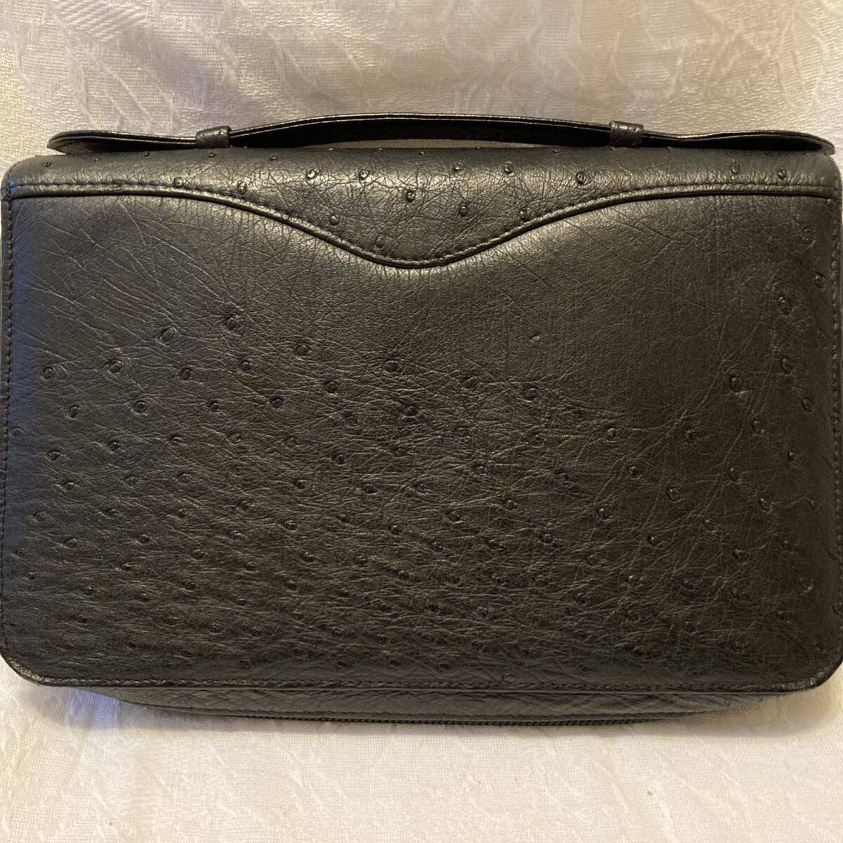 gon gong GONDLA black leather clutch bag second bag handbag pouch black long wallet Ostrich 