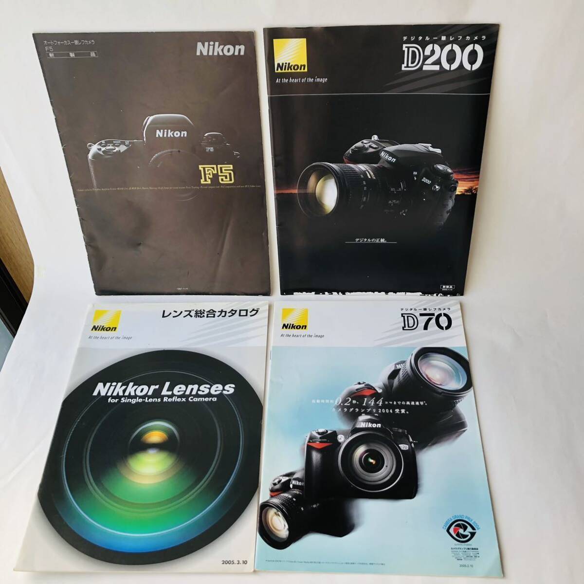 * 1997 2005 Nikon digital single‐lens reflex F5 D200 D70 lens catalog together / Nikon camera booklet enterprise advertisement 36