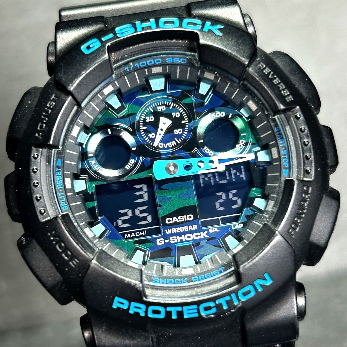 新品 CASIO カシオ G-SHOCK ジーショック GA-100CB-1A 腕時計 クオ―ツ アナデジ 多機能 カモフラージュ ブルー ブラック 迷彩 メンズ_画像1