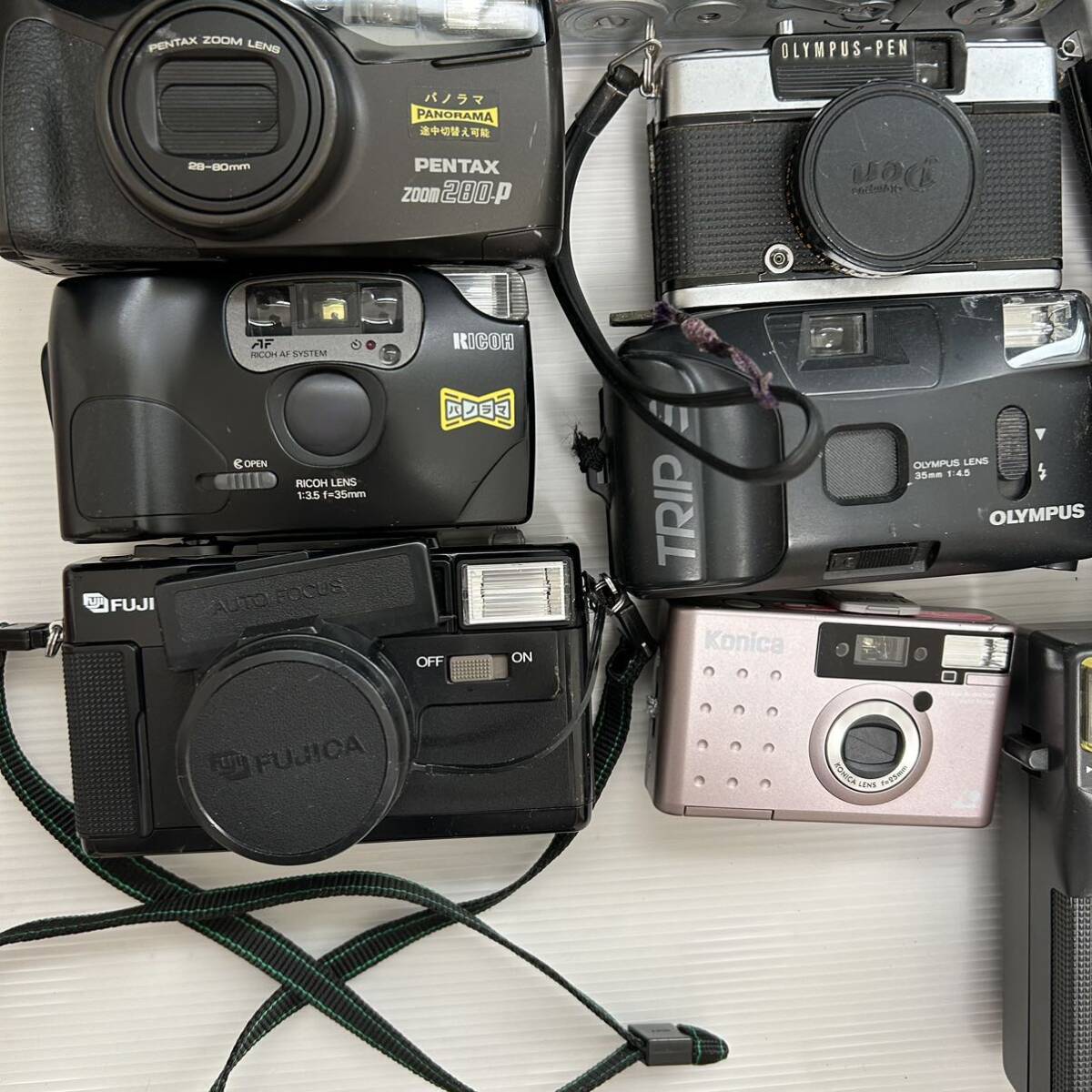 1 jpy ~ film camera video camera summarize PENTAX FUJI RICOH FUJICA KONICA OLYMPUS Canon MINOLTA SAMURAI etc. ( junk operation not yet verification KJ )