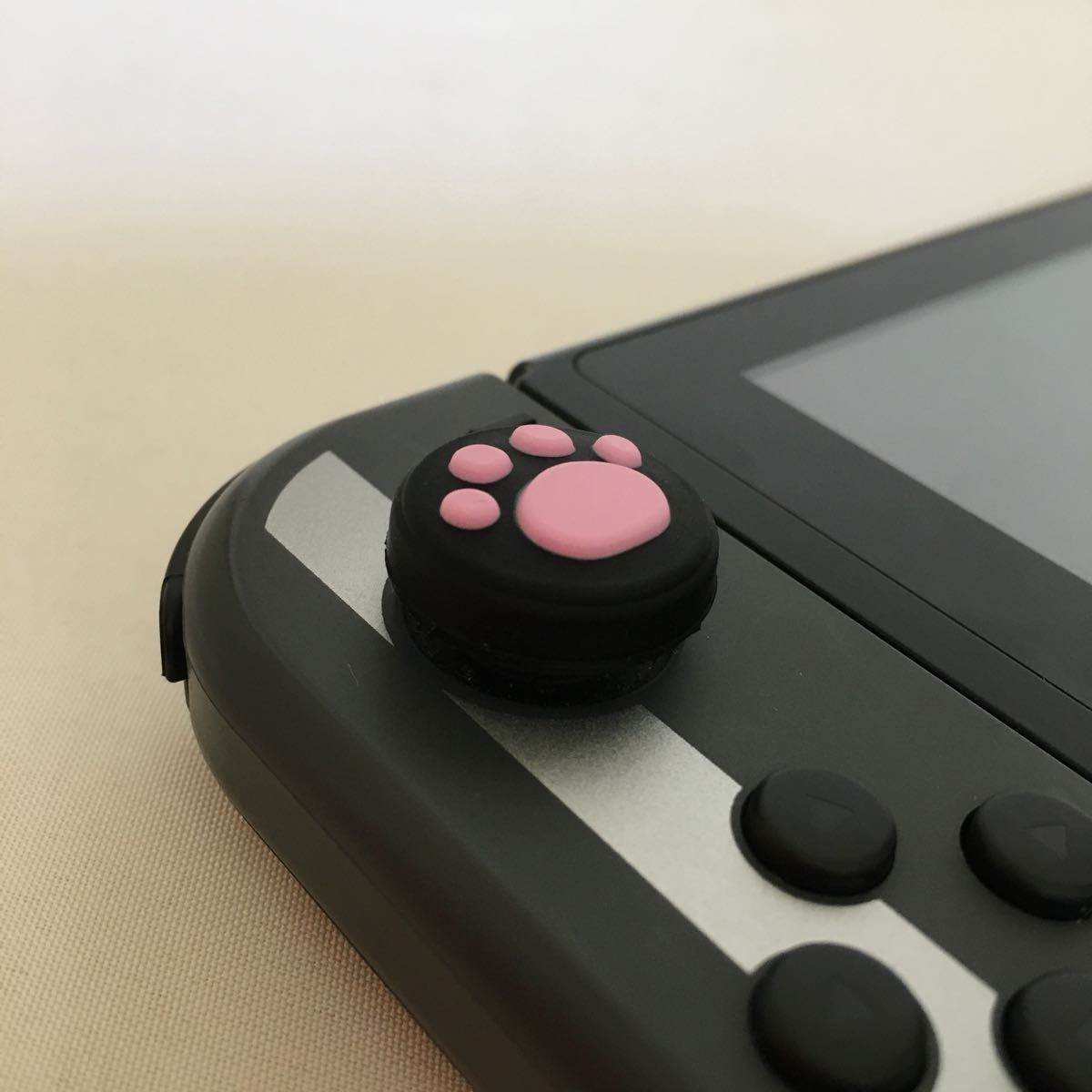 【新品】Nintendo Switch　ニンテンドー　スイッチ　ジョイコン　スティックカバー　肉球【黒ピンク2個セット】