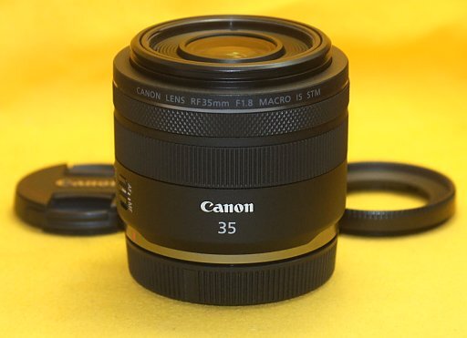 * one prompt decision * Canon original *RF 35mm F1.8 MACRO IS STM* original lens with a hood * newest farm wear . update is settled *9 sheets wings root. round shape aperture stop *EW-52