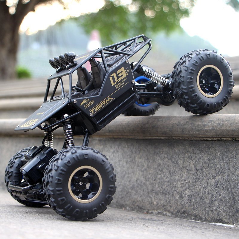 4WD ラジコンカー オフロード RCカー ラジコン 四輪駆動 操作時間25分 リモコンカー 防振性 走破性抜群 子供プレゼントに最適_画像3