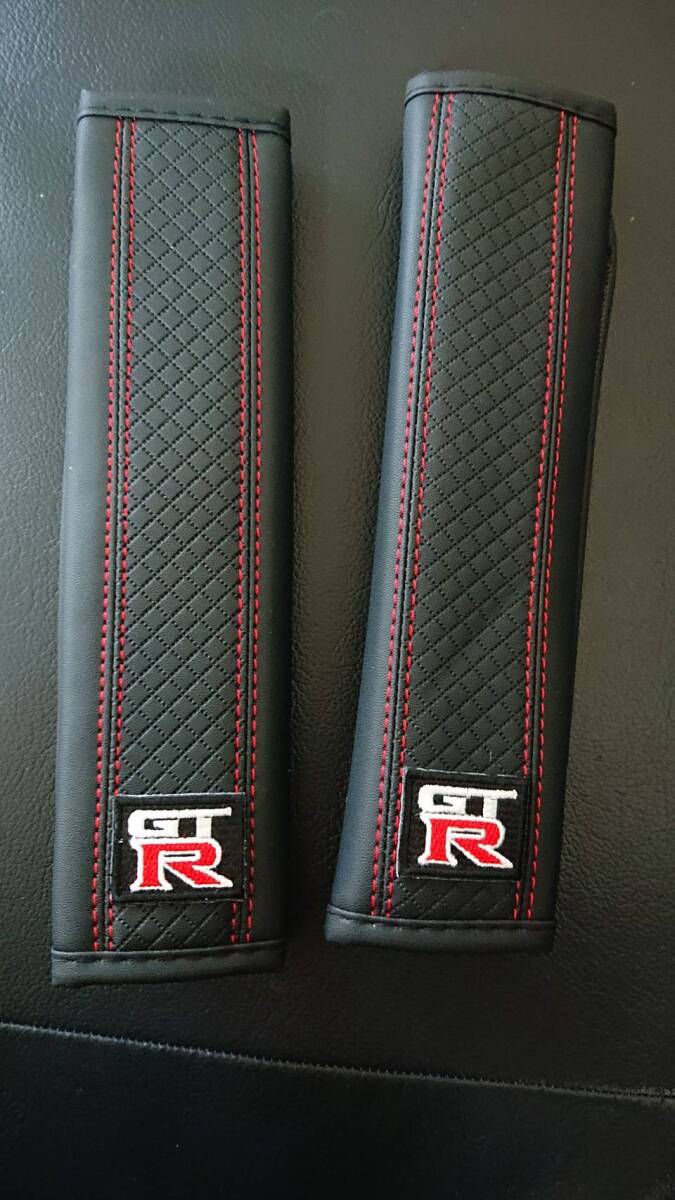  red stitch entering seat belt pad R35 GT-R