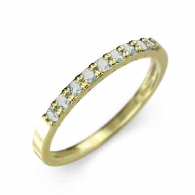 k18 yellow gold flat strike . ring half Eternity ring small . ring aquamarine width approximately 1.7mm ring small .