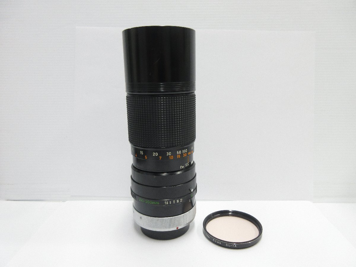 〇Canon ZOOM LENS FD 100-200mm 1:5.6 ズームレンズ 一眼 カメラ キャノン レンズフィルター付_画像1