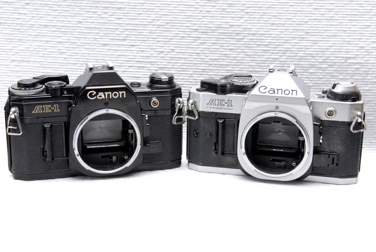 Canon キャノン製 昔の高級一眼レフカメラ（AE-1PROGRAM + AE-1）2台まとめて 希少品_画像1