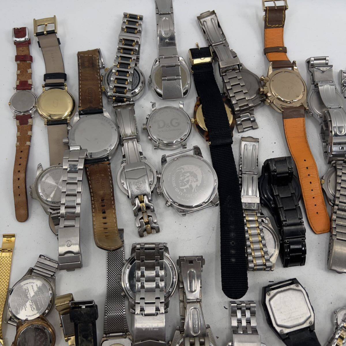 まとめ売り ファッション メーカー ブランド 腕時計 DIESEL D&G Nixon WENGER SWISS MILITARY GARMIN Calvin Klein agnes b. 色々 50本　_画像6
