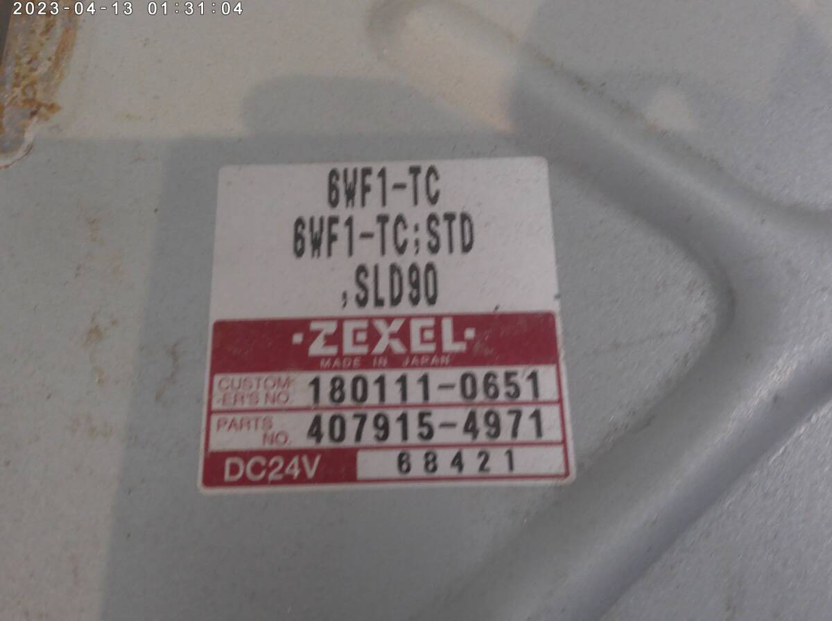 * Isuzu Giga 6WF1 ECU computer control unit computer 1801110651 ZEXEL stay attaching .*