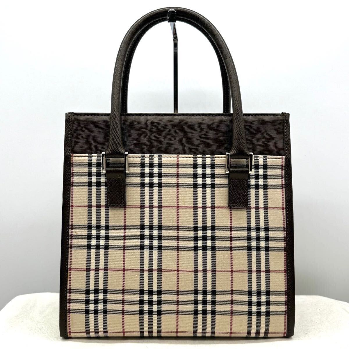 2067【未使用保管品】BURBERRY バーバリー ハンドバッグ ミニ ノバチェック ロゴ型押し プレート シルバー金具 キャンバス レザー 本革_画像2