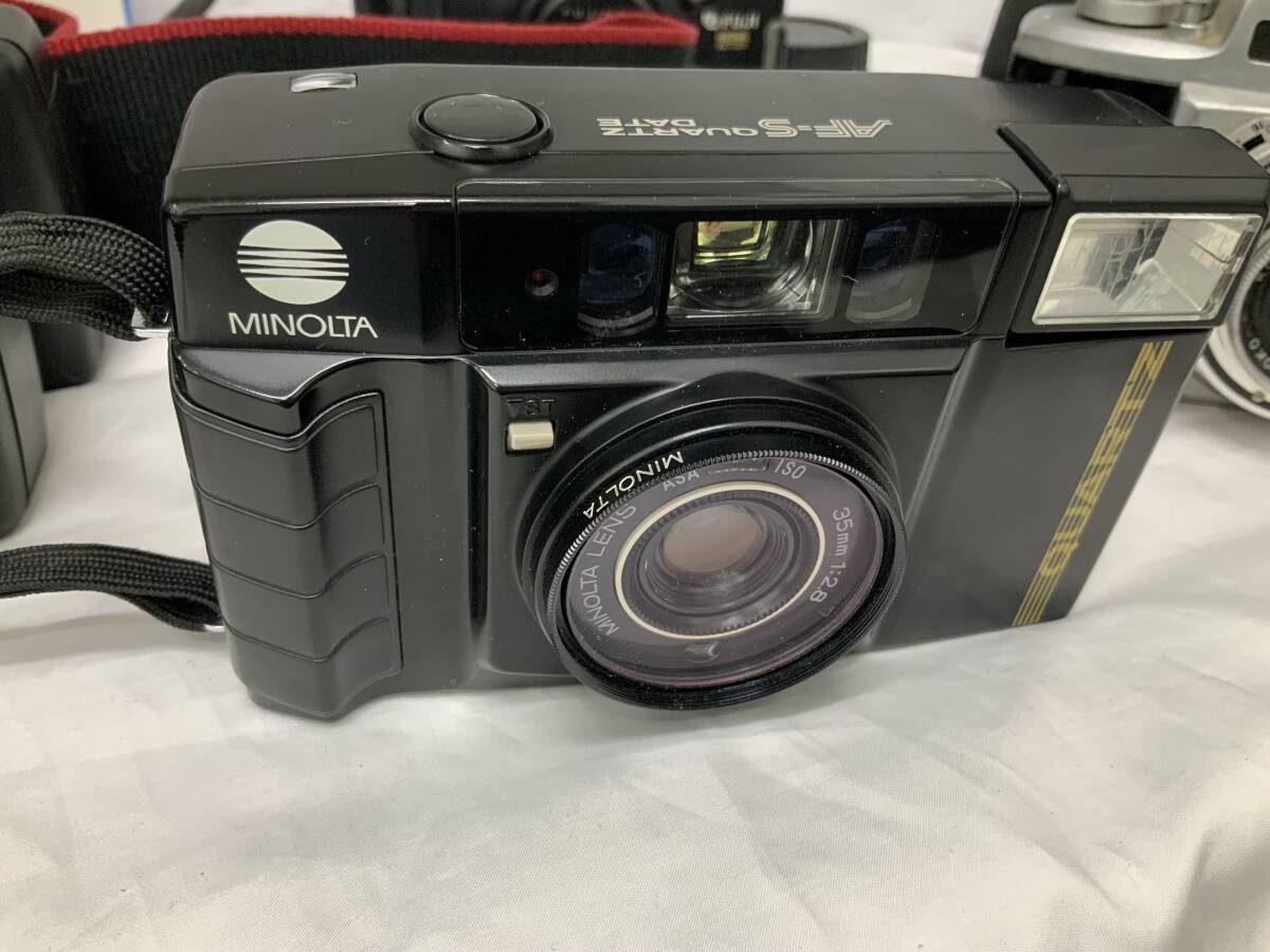 1859 1732 1722 1750 1834 1676 camera summarize Canon Minolta Konica Nikon Fuji 