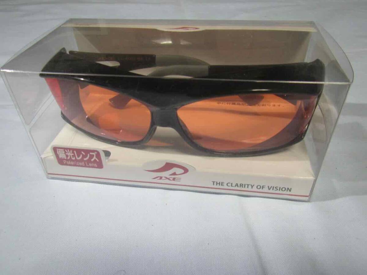 AXE Axe over glass blue cut orange polarized light 