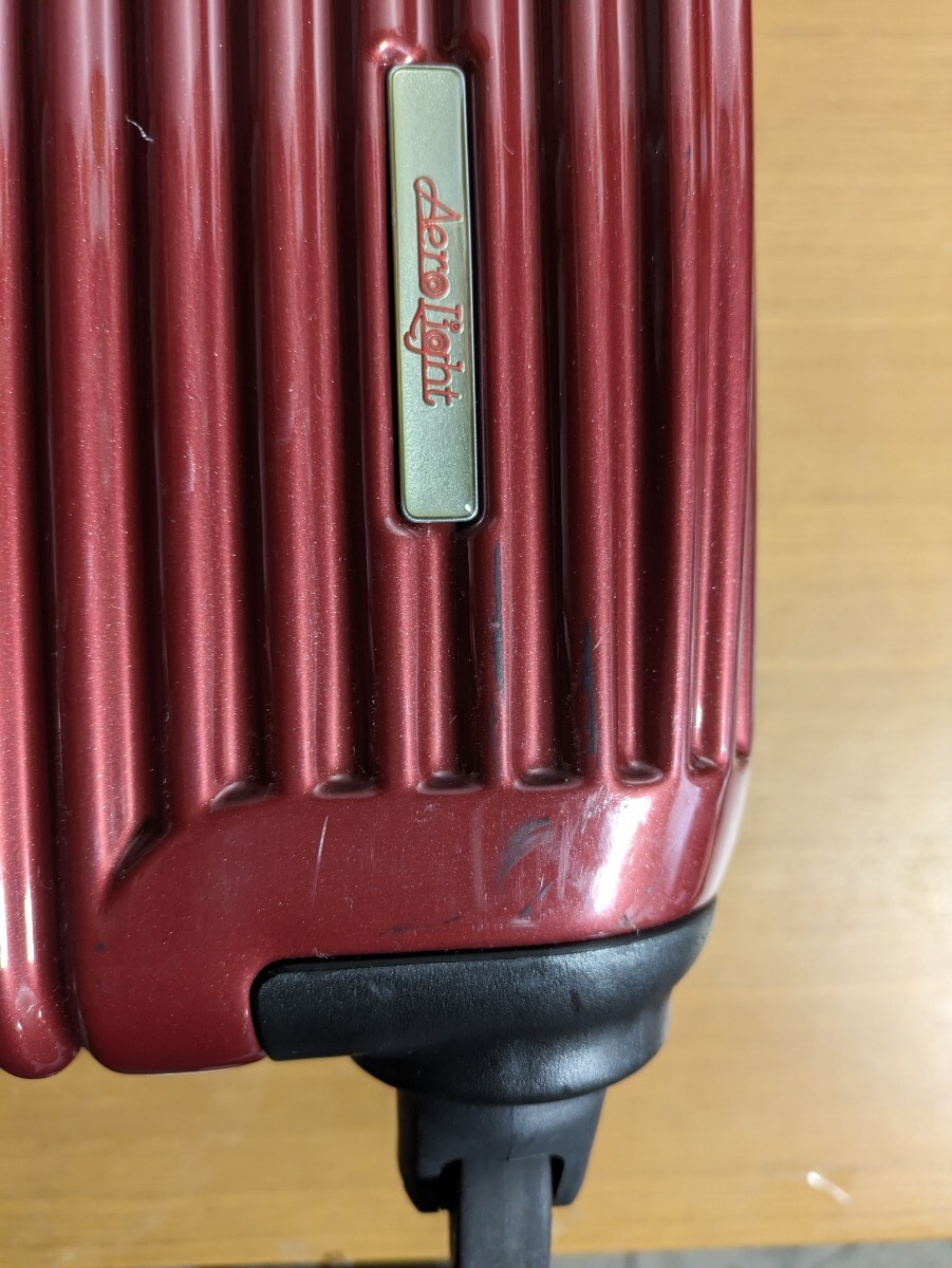 H0308.3 AERO LIGHT エアロライト スーツケース 中古 キャリーケース 旅行バッグ トランク メタリックレッド 幅43cm×高さ62cm 厚み24cmの画像9