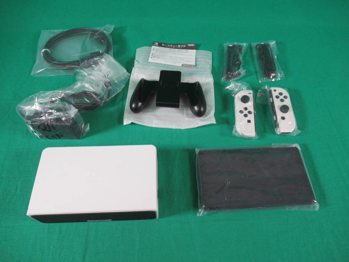 60/Q641* Nintendo switch body *Nintendo Switch body have machine EL model White white *HEG-S-KAAAA* operation verification settled / the first period . settled secondhand goods 