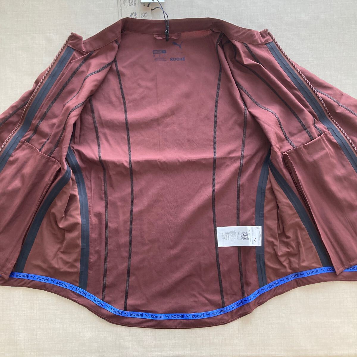 新品・未使用 ランニング ジャケット PUMA × KOCHE ◆ M ◆ 日本サイズL相当 535982 プーマ × コシェ